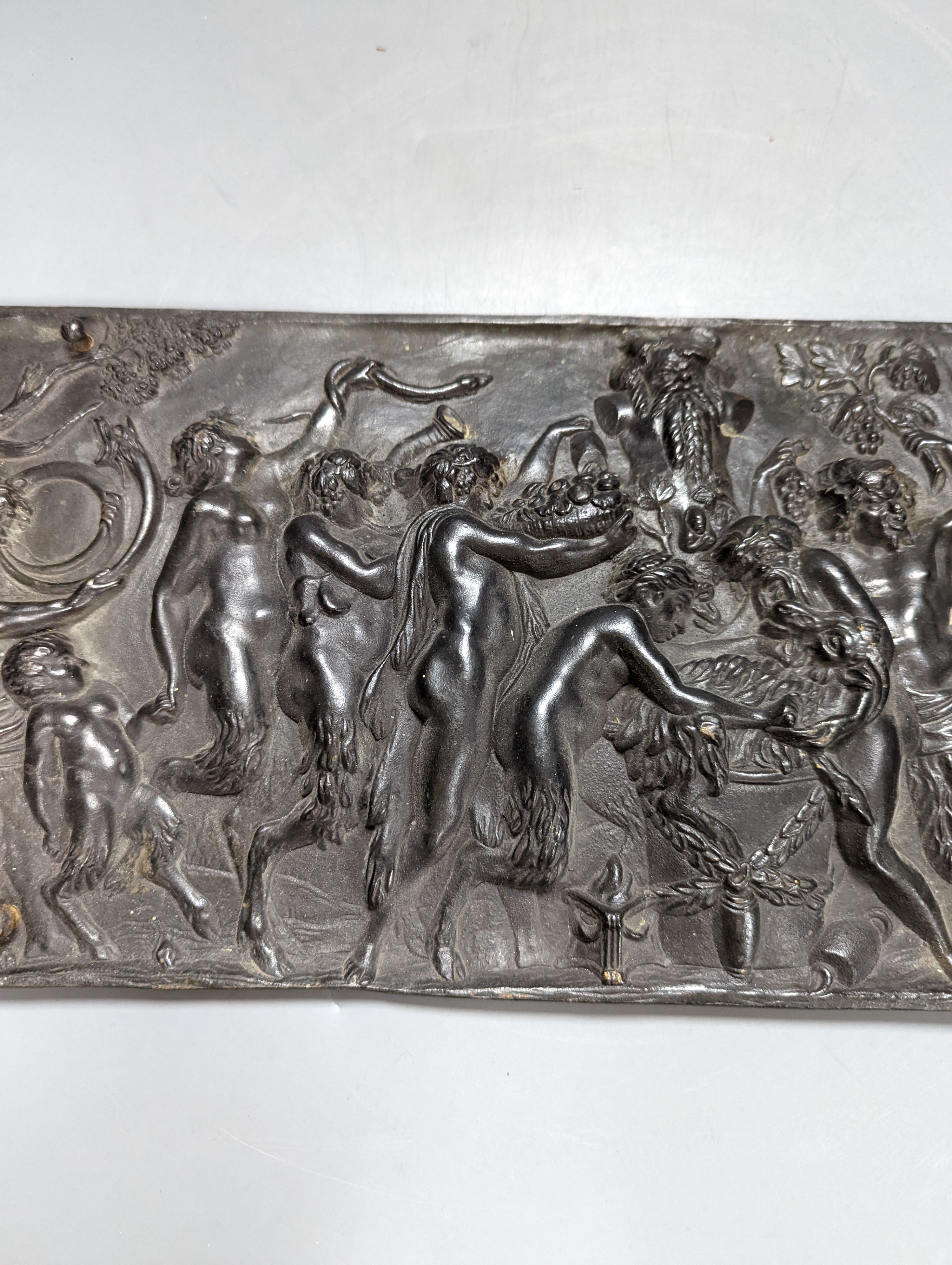 A 19th century cast bronze Bacchanalian plaque, 47 cms wide x20 high.